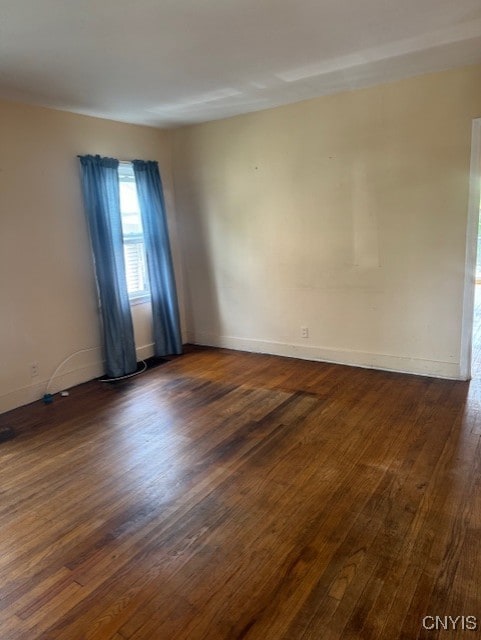 308 Wayland Rd, Salina, NY 13208 - empty room with dark wood-type flooring and baseboards