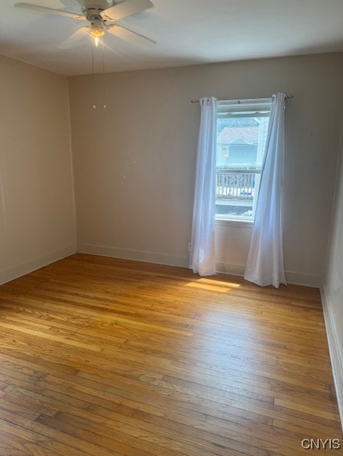 308 Wayland Rd, Salina, NY 13208 - unfurnished room featuring light wood-type flooring and ceiling fan