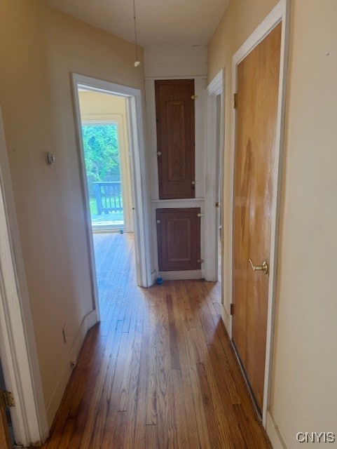 308 Wayland Rd, Salina, NY 13208 - corridor with wood finished floors and baseboards