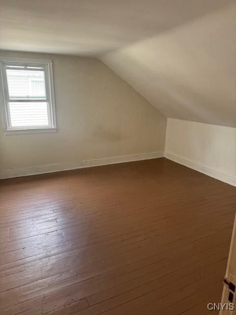 308 Wayland Rd, Salina, NY 13208 - bonus room featuring vaulted ceiling and dark wood-style flooring