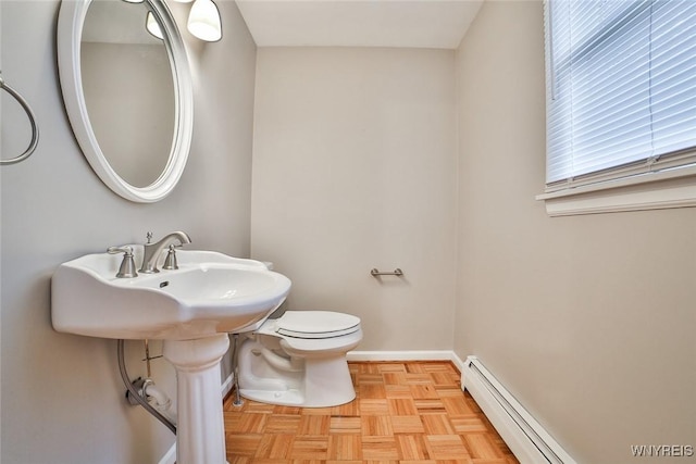 46 Macarthur Dr, Amherst, NY 14221 - bathroom featuring a baseboard radiator and toilet