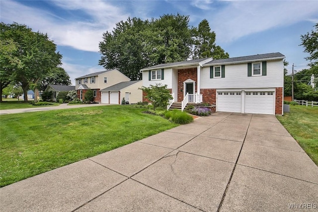 46 Macarthur Dr, Amherst, NY 14221 - bi-level home with a front lawn, brick siding, an attached garage, and concrete driveway