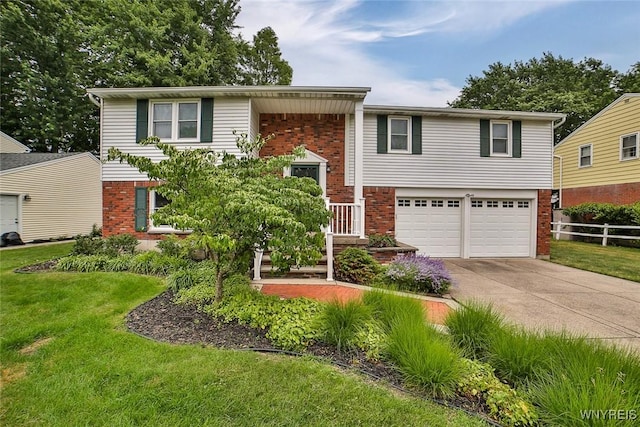 46 Macarthur Dr, Amherst, NY 14221 - split foyer home with brick siding, an attached garage, and concrete driveway