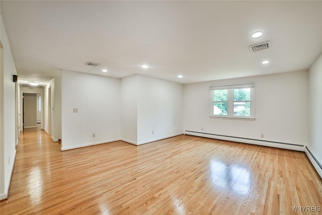 46 Macarthur Dr, Amherst, NY 14221 - unfurnished room featuring baseboard heating, light wood-type flooring, and recessed lighting