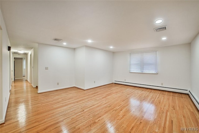 46 Macarthur Dr, Amherst, NY 14221 - spare room featuring baseboard heating, light wood-style flooring, and recessed lighting