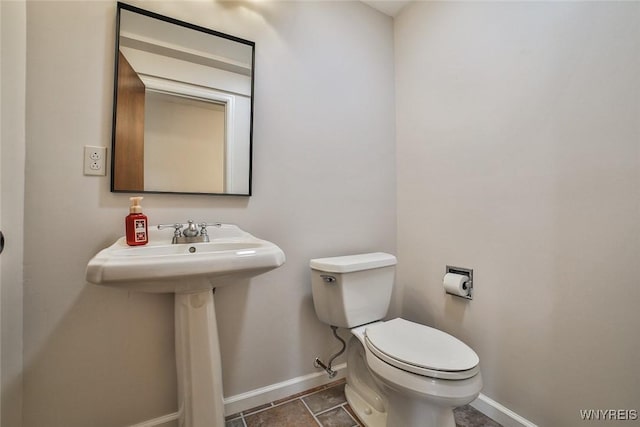 46 Macarthur Dr, Amherst, NY 14221 - half bathroom featuring baseboards