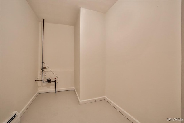 46 Macarthur Dr, Amherst, NY 14221 - washroom featuring a baseboard radiator and light colored carpet