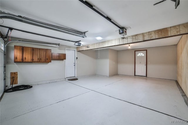46 Macarthur Dr, Amherst, NY 14221 - garage with a garage door opener