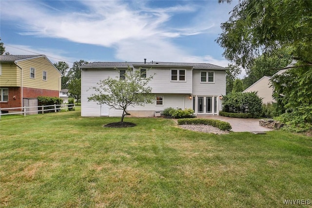 46 Macarthur Dr, Amherst, NY 14221 - back of property featuring french doors and a patio