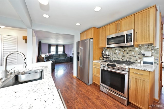 120 Cloverside Ct, West Seneca, NY 14224 - kitchen featuring stainless steel appliances, dark wood finished floors, open floor plan, light stone counters, and backsplash