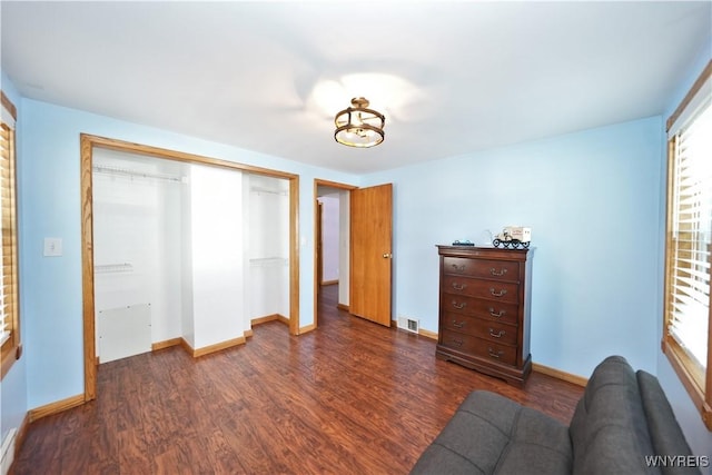 120 Cloverside Ct, West Seneca, NY 14224 - bedroom with dark wood-type flooring, a closet, and multiple windows