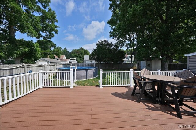 120 Cloverside Ct, West Seneca, NY 14224 - wooden deck featuring outdoor dining area, a fenced backyard, and a shed