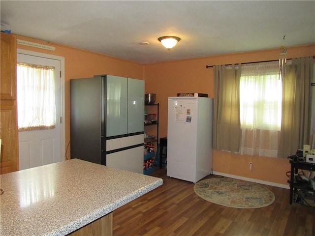18 Mark Cir, Naples, NY 14512 - kitchen with freestanding refrigerator, dark wood-style flooring, and light countertops