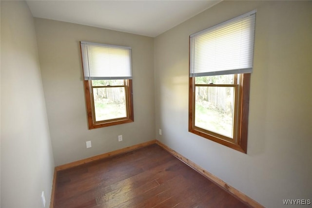 51 N Forest Rd, Amherst, NY 14221 - empty room featuring dark wood finished floors and plenty of natural light