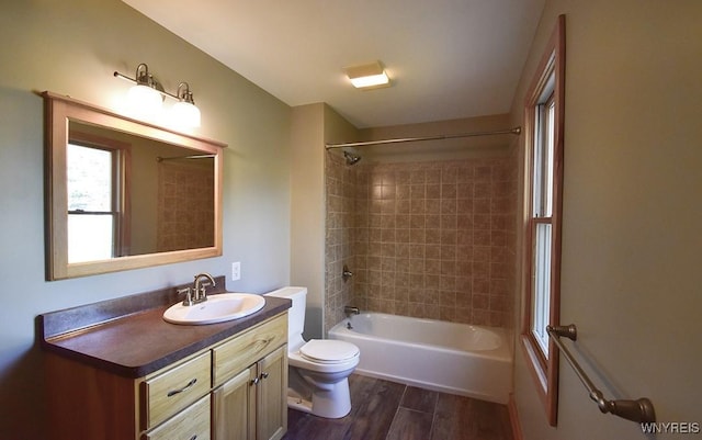 51 N Forest Rd, Amherst, NY 14221 - full bath with wood finished floors, vanity, and shower / washtub combination