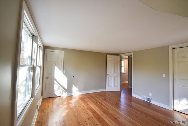 51 N Forest Rd, Amherst, NY 14221 - empty room with light wood-type flooring and plenty of natural light