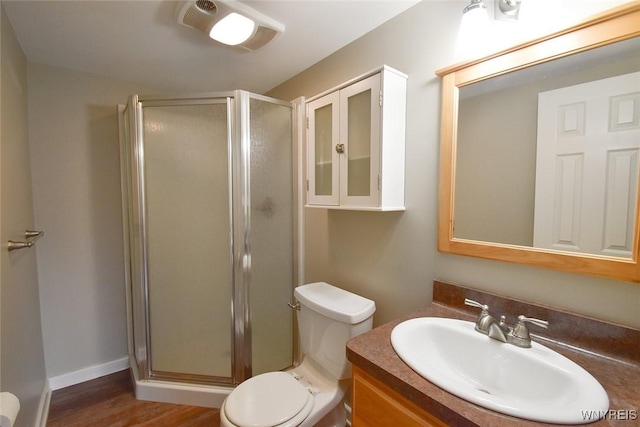 51 N Forest Rd, Amherst, NY 14221 - full bathroom with a stall shower, vanity, and wood finished floors