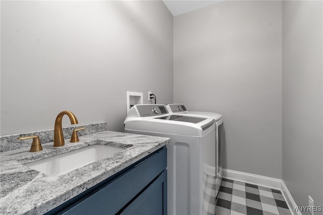 6993 Pine Lk, Pendleton, NY 14120 - laundry room featuring washing machine and dryer and baseboards