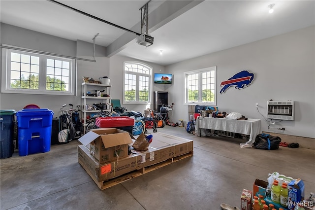 6993 Pine Lk, Pendleton, NY 14120 - garage featuring heating unit and a garage door opener