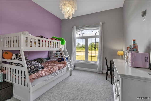 6993 Pine Lk, Pendleton, NY 14120 - bedroom with a chandelier and light colored carpet