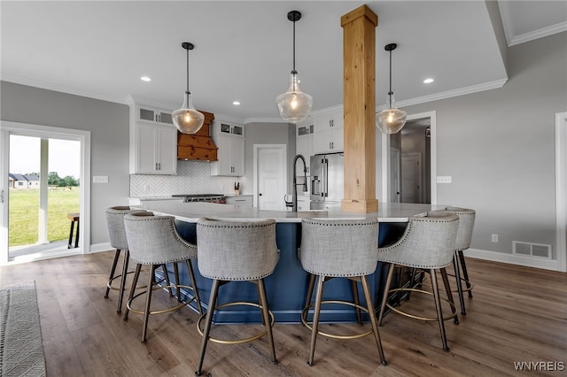 6993 Pine Lk, Pendleton, NY 14120 - kitchen with white cabinets, dark wood-style floors, backsplash, recessed lighting, and glass insert cabinets