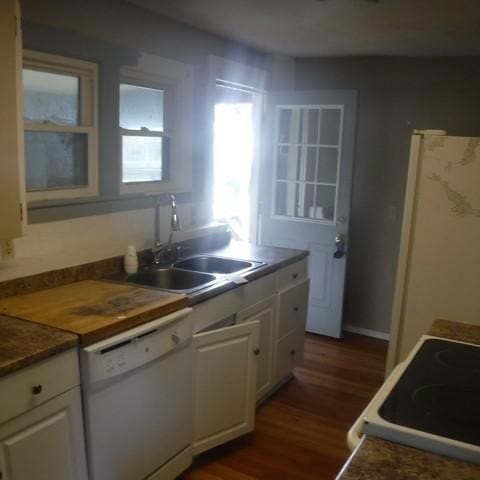 13 E Albion St, Murray, NY 14470 - kitchen with white appliances, white cabinets, and dark wood-style flooring