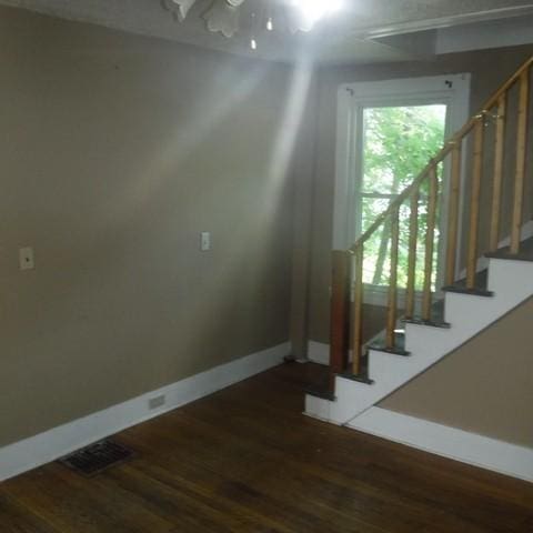 13 E Albion St, Murray, NY 14470 - stairway with baseboards and wood finished floors