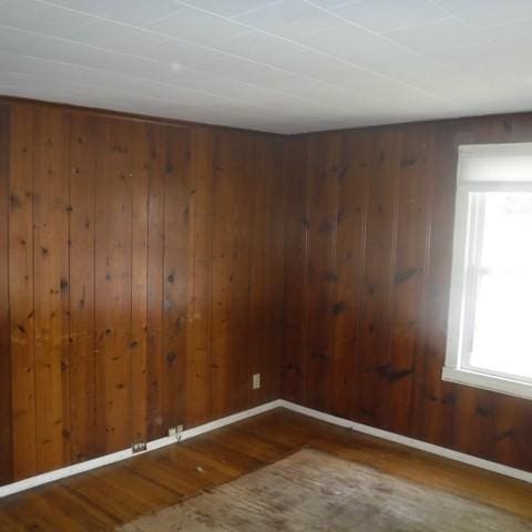 13 E Albion St, Murray, NY 14470 - unfurnished room with wood finished floors and wood walls