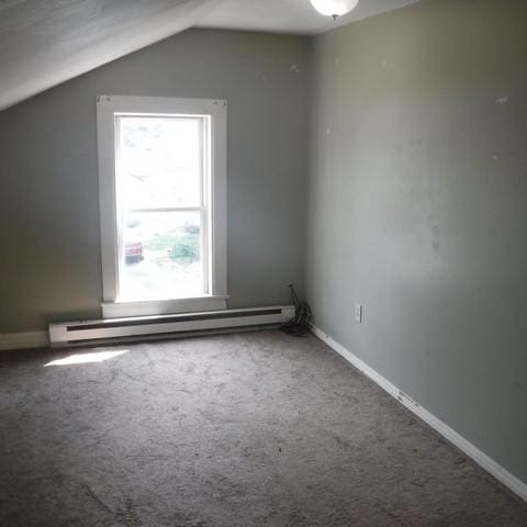 13 E Albion St, Murray, NY 14470 - additional living space with baseboard heating, plenty of natural light, carpet floors, and vaulted ceiling