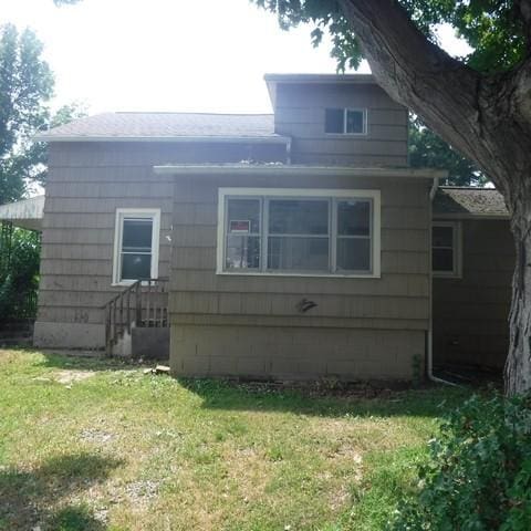 13 E Albion St, Murray, NY 14470 - view of side of property with a yard