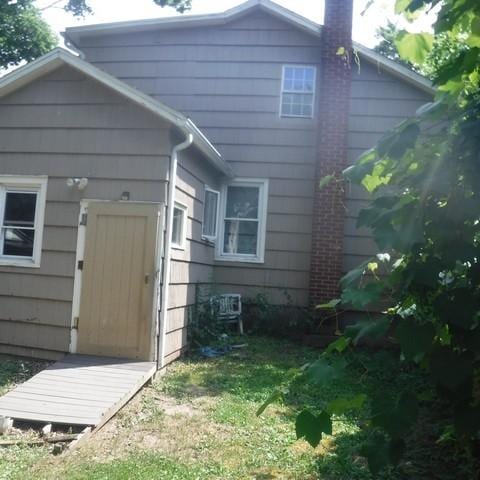 13 E Albion St, Murray, NY 14470 - rear view of house featuring a shed