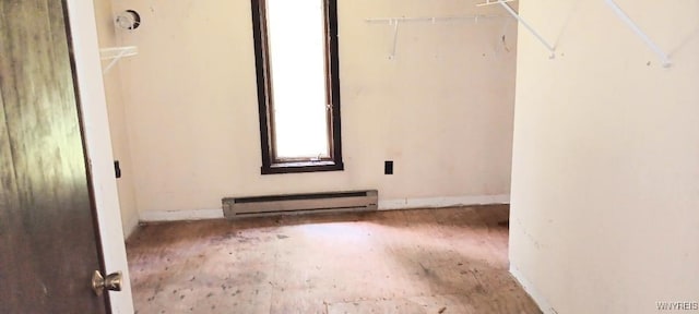 8567 Fairview Ter, Colden, NY 14033 - walk in closet with a baseboard heating unit