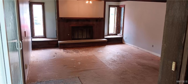 8567 Fairview Ter, Colden, NY 14033 - unfurnished living room featuring healthy amount of natural light