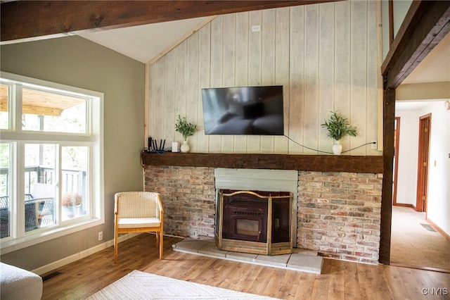 1346 Otisco Valley Rd, Otisco, NY 13110 - living area featuring lofted ceiling, wood finished floors, and wood walls