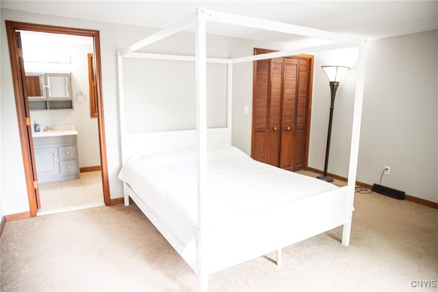 1346 Otisco Valley Rd, Otisco, NY 13110 - carpeted bedroom featuring connected bathroom and a closet