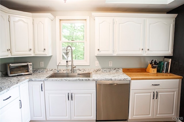 1346 Otisco Valley Rd, Otisco, NY 13110 - kitchen with stainless steel dishwasher and white cabinetry