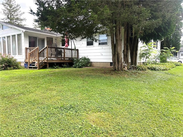 2 Maple Rd, Big Flats, NY 14845 - view of green lawn featuring a wooden deck