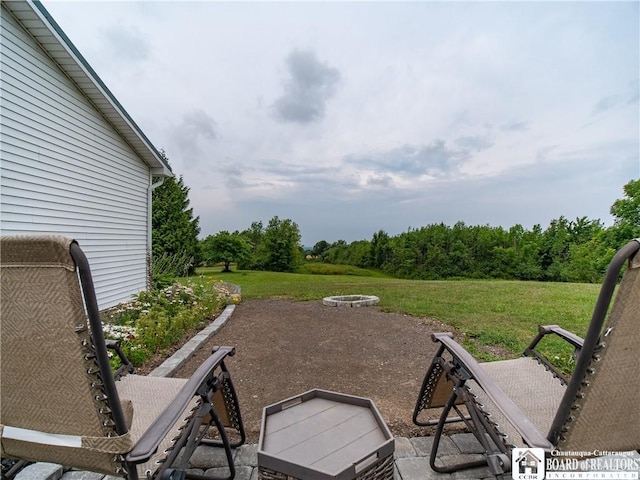 8800 Harmon Hill Rd, Pomfret, NY 14063 - view of patio / terrace with an outdoor fire pit