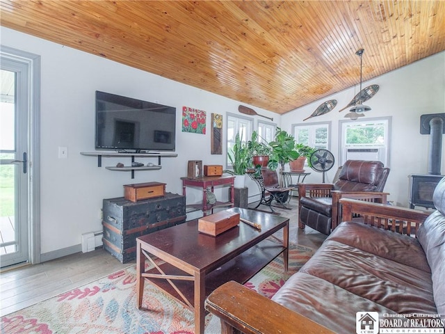 8800 Harmon Hill Rd, Pomfret, NY 14063 - living area featuring a wood stove, plenty of natural light, lofted ceiling, wooden ceiling, and wood finished floors