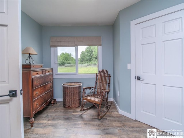 8800 Harmon Hill Rd, Pomfret, NY 14063 - living area featuring wood finished floors and baseboards