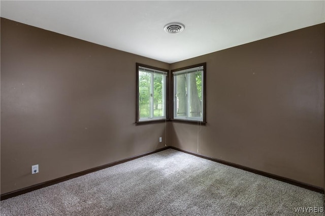 26 Farber Ln, Amherst, NY 14221 - carpeted empty room featuring baseboards
