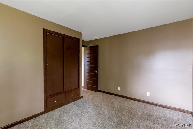 26 Farber Ln, Amherst, NY 14221 - unfurnished bedroom featuring carpet flooring and a closet