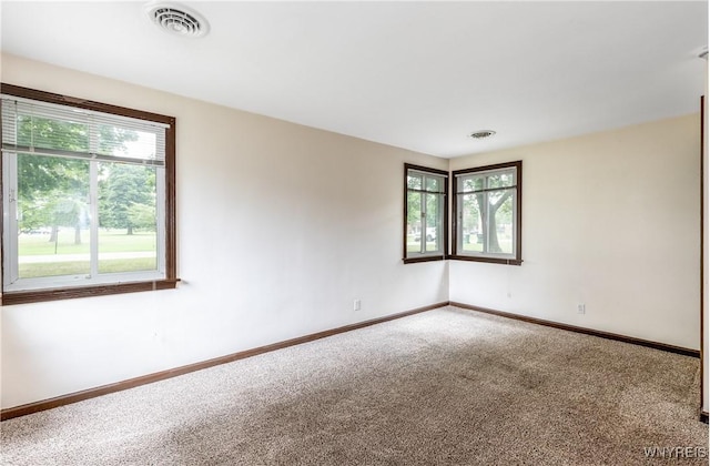 26 Farber Ln, Amherst, NY 14221 - carpeted spare room featuring baseboards