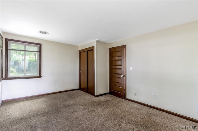 26 Farber Ln, Amherst, NY 14221 - unfurnished bedroom featuring carpet floors and a closet
