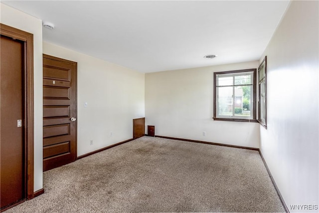 26 Farber Ln, Amherst, NY 14221 - unfurnished room featuring carpet floors and a smoke detector