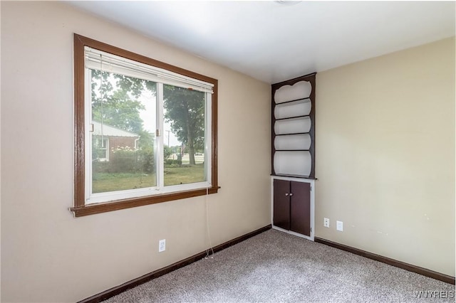 26 Farber Ln, Amherst, NY 14221 - unfurnished room featuring carpet flooring and baseboards