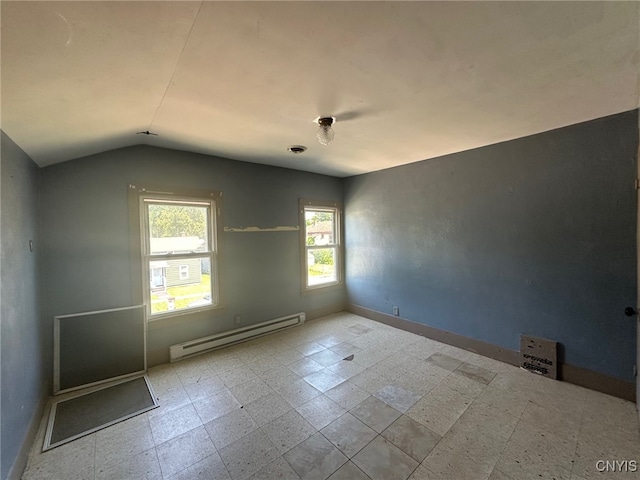85 W Clark St, German Flatts, NY 13357 - empty room with a baseboard heating unit and lofted ceiling