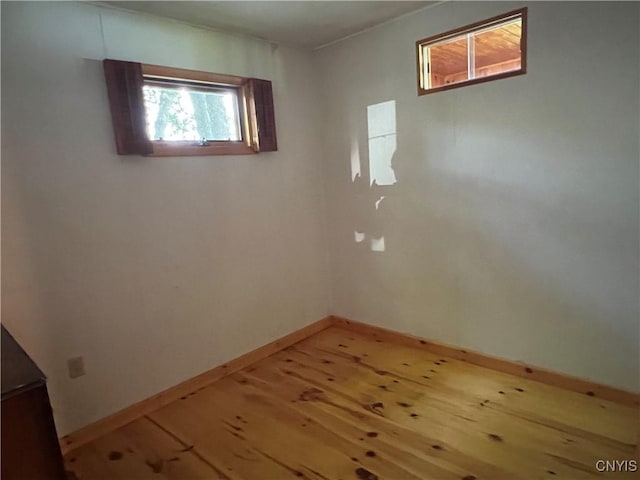 8227 Catfish Point Rd, Cape Vincent, NY 13624 - spare room with light wood finished floors and baseboards