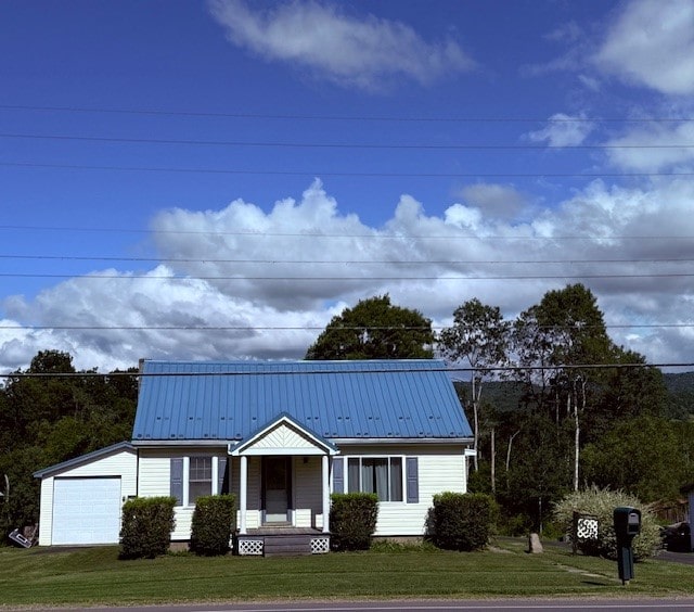 6113 Rte 46, Keating Town, PA 16749 - view of front of property featuring a front yard and a metal roof