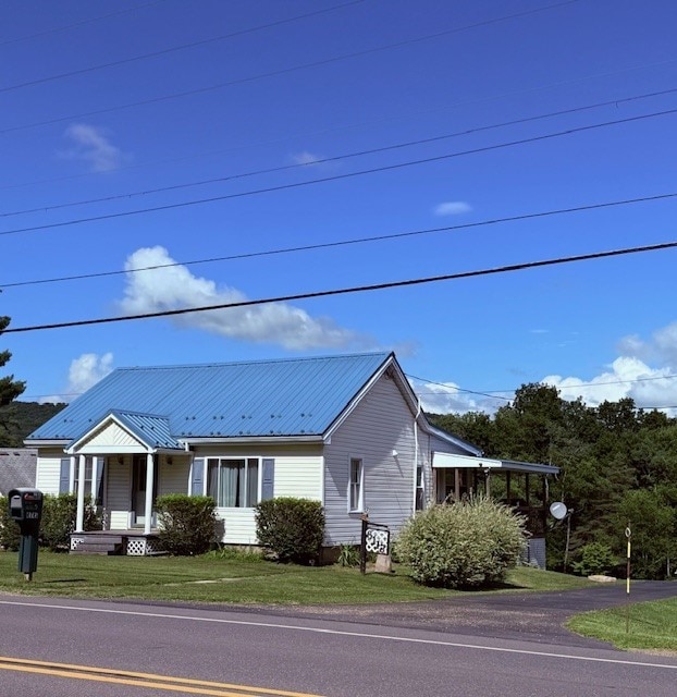 6113 Rte 46, Keating Town, PA 16749 - view of front facade with a front lawn and a metal roof